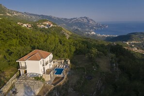 Stunning view over the Adriatic Sea, Old Town Budva and St Nikola Island.
