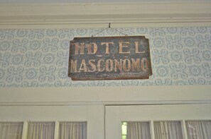 A sign in the foyer is a reminder of the home's history as a hotel.