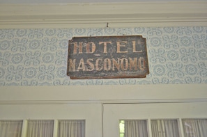 A sign in the foyer is a reminder of the home's history as a hotel.