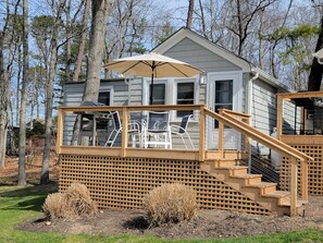 steps to two-bedroom cottage and deck with waterfront views