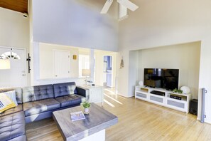 To the left of the living room, walk into the kitchen and dining area.