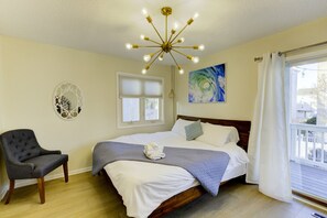 The second floor has one queen bed bedroom. So much storage in this brightly colored haven.