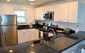 Looking over the low-bar into the kitchen.