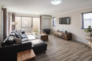 Living area- Arcade machine and Smart TV