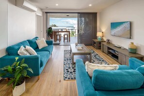 Beautifully appointed and colourful living room.