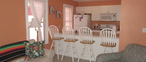 Main Level | Kitchen - Bar stool seating at the counter of the kitchen