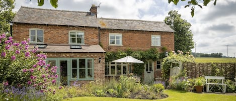 The quintessentially English garden at Southcroft Cottage in Bredon's Norton