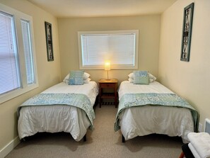 XL Twin Beds, luggage rack, closet, nightstand