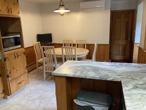 Kitchen seating area with TV