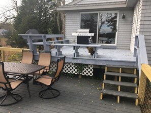 New gas grill and 6 seater dining table with umbrella