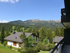 Sky, Plant, Property, Building, Mountain, Tree, Cloud, Window, Highland, Architecture