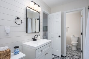 Bathroom set is so convenient for multiple guests.  Private shower, toilet and vanity with and additional vanity in separate private space.