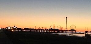 Sunset view of Pleasure Pier. 