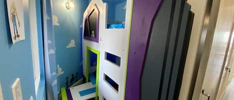 “Andy’s theme room” with twin bunk beds w/ smart TV’s 