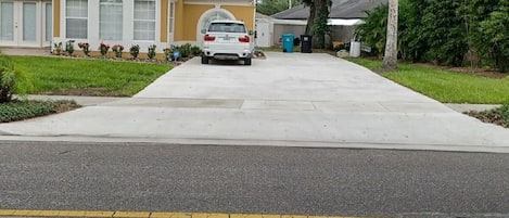 Huge driveway, room  for toys, motorcycles, trailer, designated   parking space.