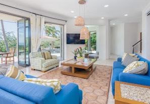 Living Room. Folding doors open to pool terrace.