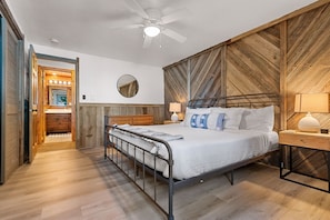 The master bedroom features a comfortable king, nightstands for each guest, and device chargers as well to let you and your devices recharge for another day of exploring Door County!