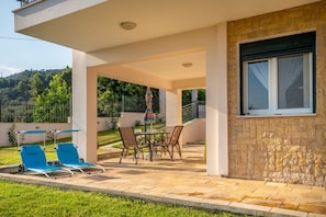 relaxing under the sun in the patio