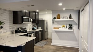 The kitchen is fully stocked with a fridge, freezer, dishwasher, microwave, stainless steel oven, air fryer, blender, knives, cooking utensils, pots/pans, coffee maker and tea kettle   We offer guest complimentary coffee and tea for those early mornings a