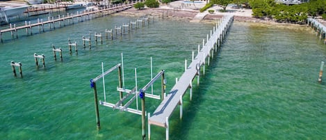 At the end of the 180' pier, approximately 32' of dockage awaits, providing a convenient berth for your boat. Boat lift not available for guest use.