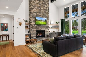 Freebird: - Luxurious great room with soaring 30' ceilings and a floor to ceiling gas ledgestone fireplace.