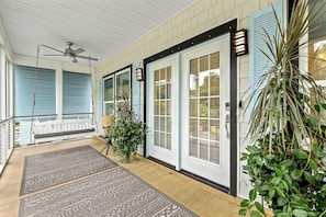 Lovely front entrance & porch swing invites you to enjoy the mornings or sunsets