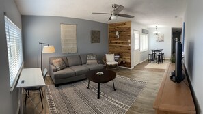 Spacious living space, including a desk recently added for remote work/school