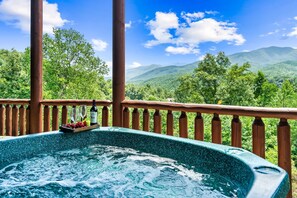 Relax in your hot tub on a cool fall/winter evening under the covered patio