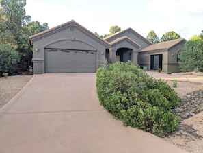 The home sits on a corner lot of a cul-de-sac. Front door has a keyless pad.