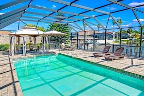 Beautiful pool overlooking canal and dock