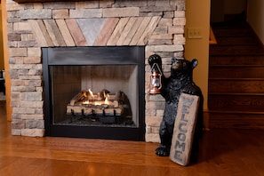 The gas fireplace with remote makes it easy to warm up chilly morning.