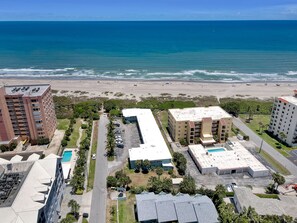 Our place. A small, 2 story horseshoe shaped building, direct ocean front.