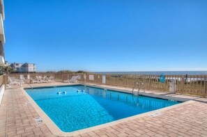 Take a cool dip in the pool after a fun day at the beach.
