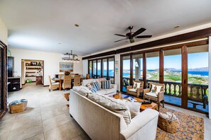 Living room upon entrance from pool area.