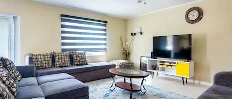 Modern, bright, clean, safe 2BR/2BA MoBay condo. Spacious living room, SmartTV.