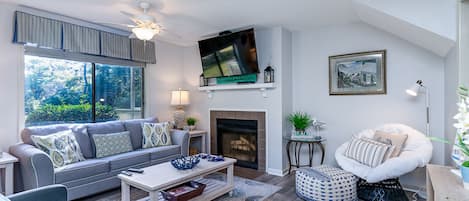 Living room - Gorgeous living room with pull out sofa, faux fireplace and access to the back porch.