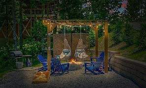hang out by the firepit under the string lights
