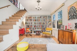 eclectric collection of books from around the world and local california artists