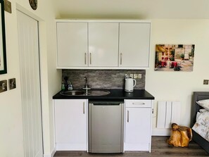 Well equipped kitchenette, with microwave, hob, kettle and toaster