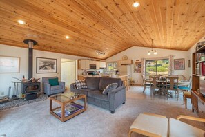 Large open concept living room, dining, and kitchen
