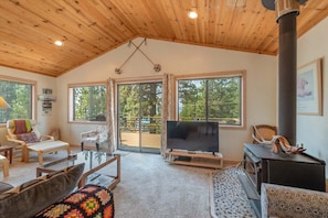 Bright and sunny and woodstove fireplace