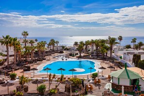 Pool resort, sun shade, sun lounger, pool bar