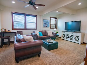 Comfortable living room w/ Roku TV.