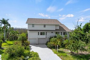 Front of this 4 bedroom 4 bath estate