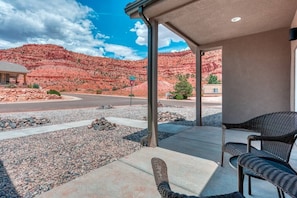 Enjoy a cup of coffee each morning on the front porch with red rock views.