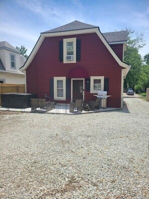 Large backpack patio perfect for unwinding in the hot tub or grilling.