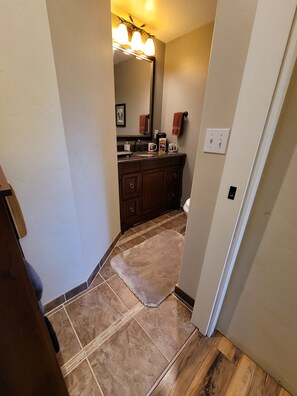 Heated tile, custom vanity. 