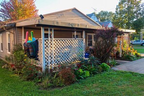 Tropical landscape around 250 sq ft covered patio. Sep ‘21