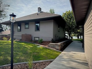 New: paved walkway, landscaping, and pathway lighting