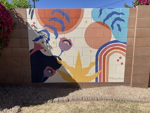 Take a pic in front of the new mural and tag us on your favorite social media site! #happyhaus #goodlifevacationhomes